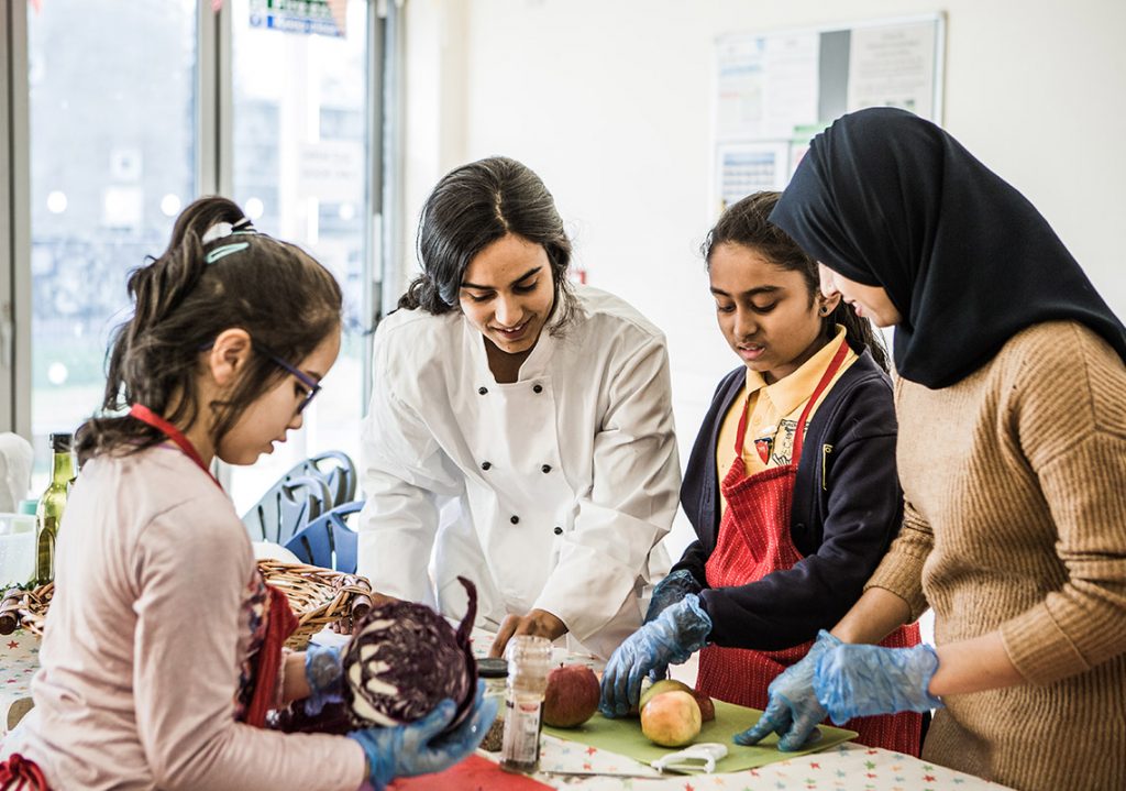 Community member cook at Health Train project funded by HS2 fund grants