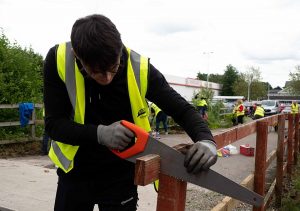 Man repairing fence