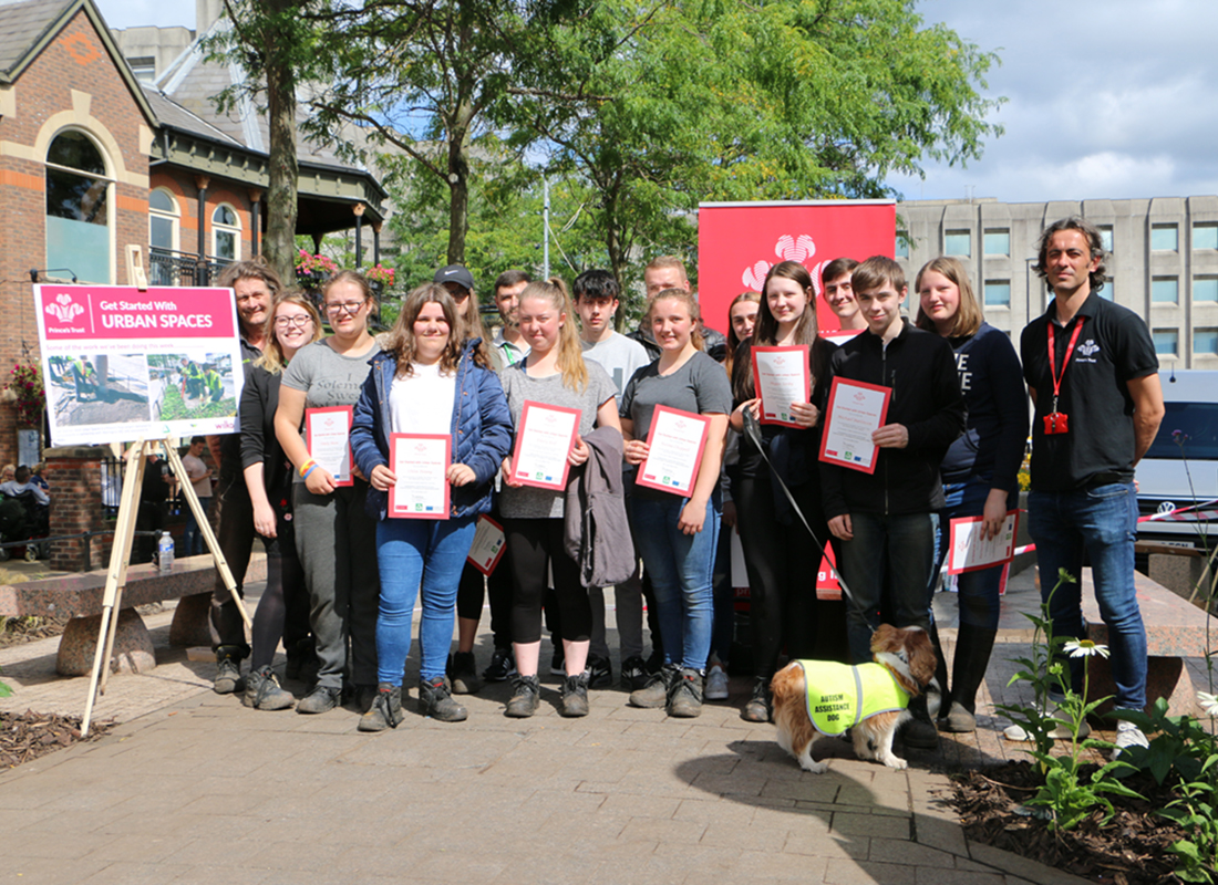 Young people celebrating completing Urban Spaces programme