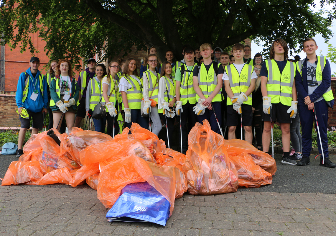 Young people removing rubbish in St Helens