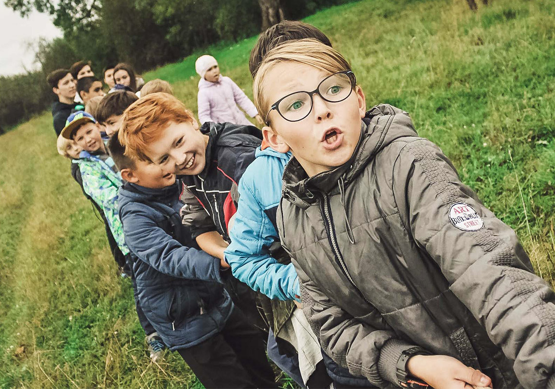 Children play tug-of-war