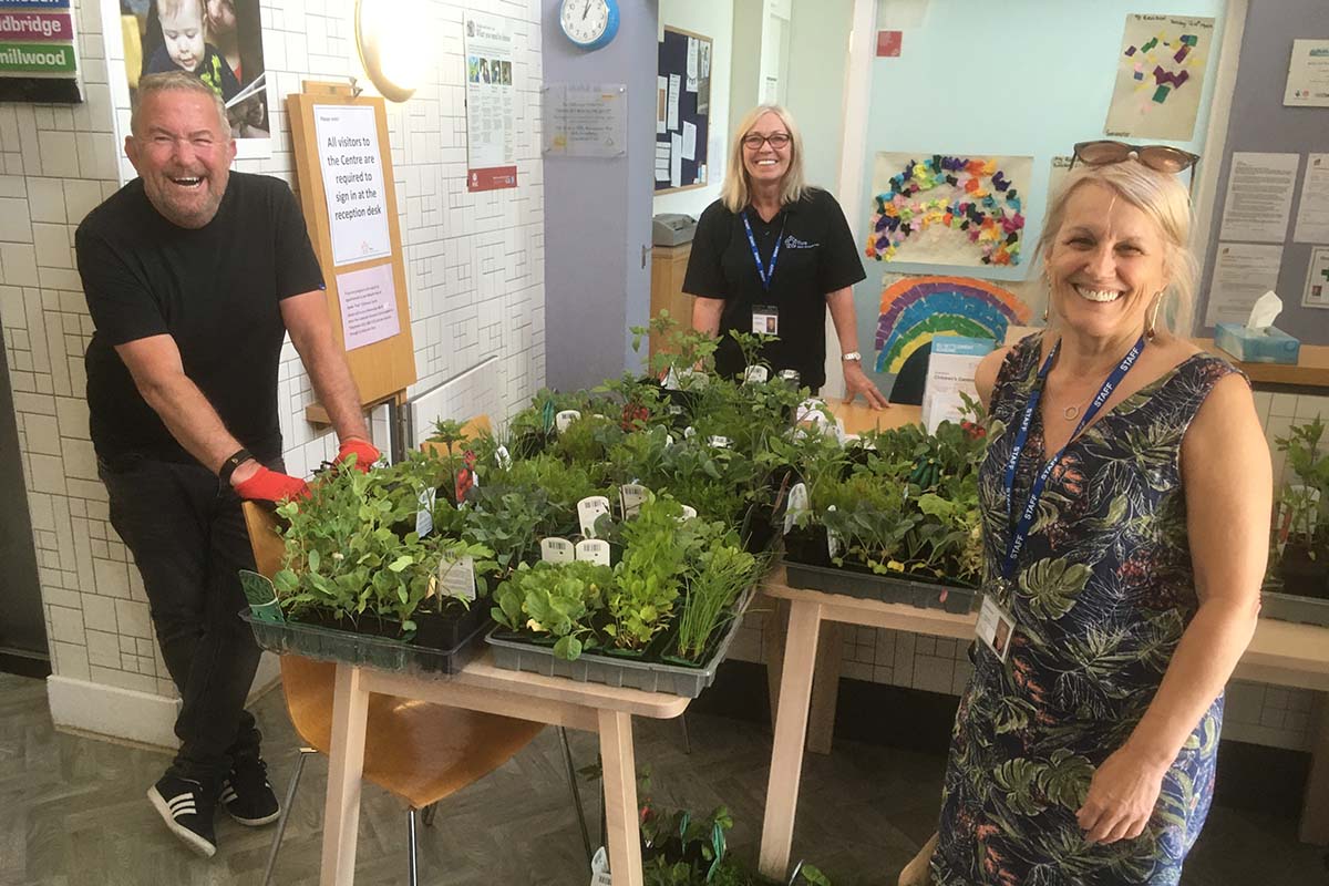 Joe Cummings from Grow Speke with staff from the Five Children and Family Centre in Speke