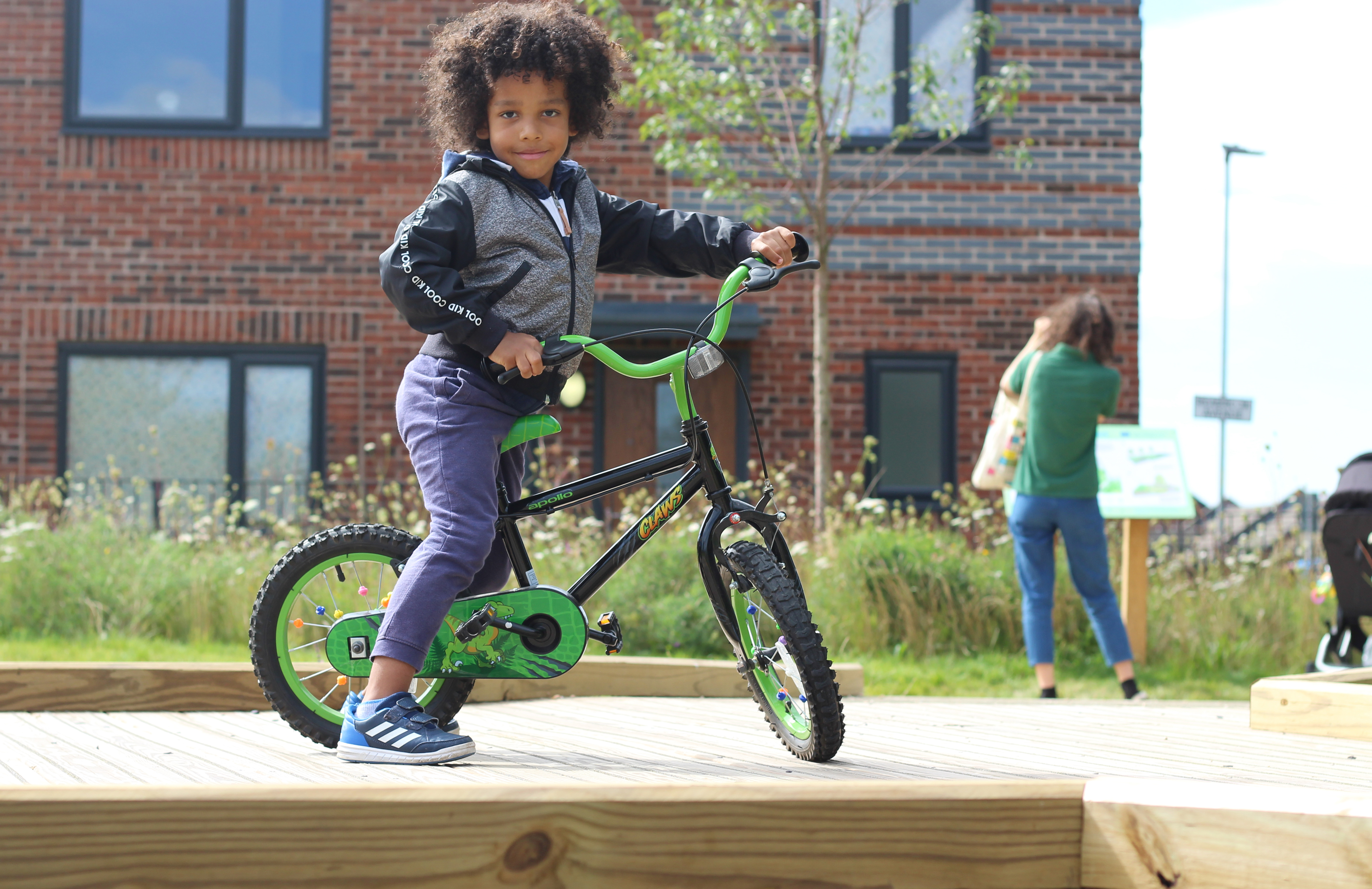 Boy on Bike In the Park
