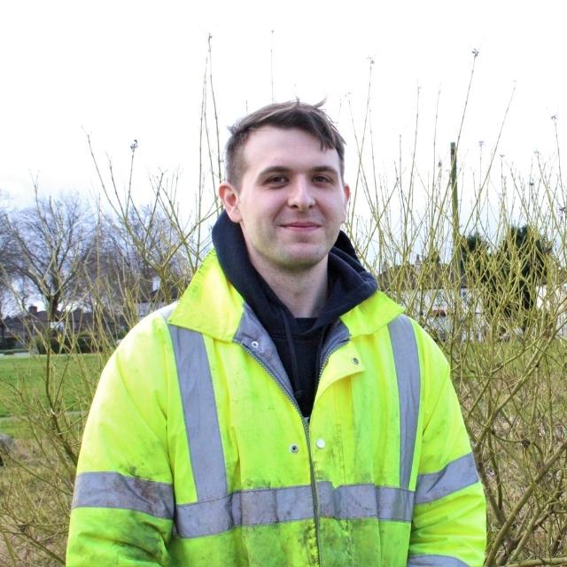 Callum smiling in his uniform as part of the Low Carbon Careers course