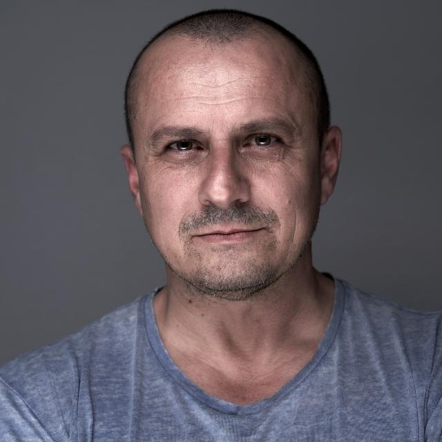 A man (Stephen) smiling at the camera after taking part in the Turning Point programme