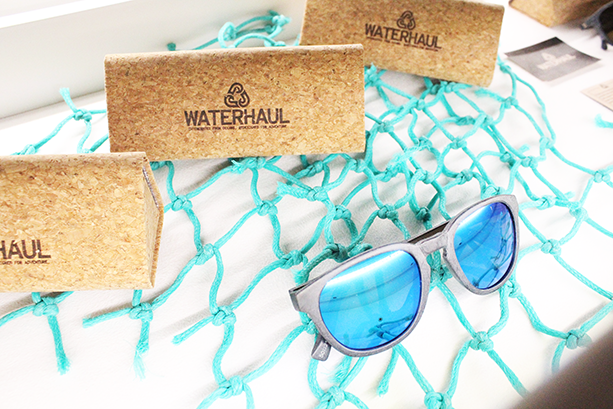 Sustainable sunglasses brand Waterhaul featuring a blue pair of sunglesses with fishnet at The Good Store