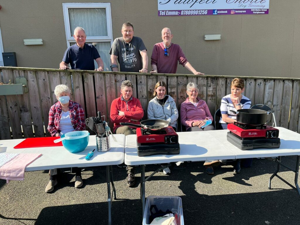 Portglenone Mens Sheds Slow Cookers outside at picnic table