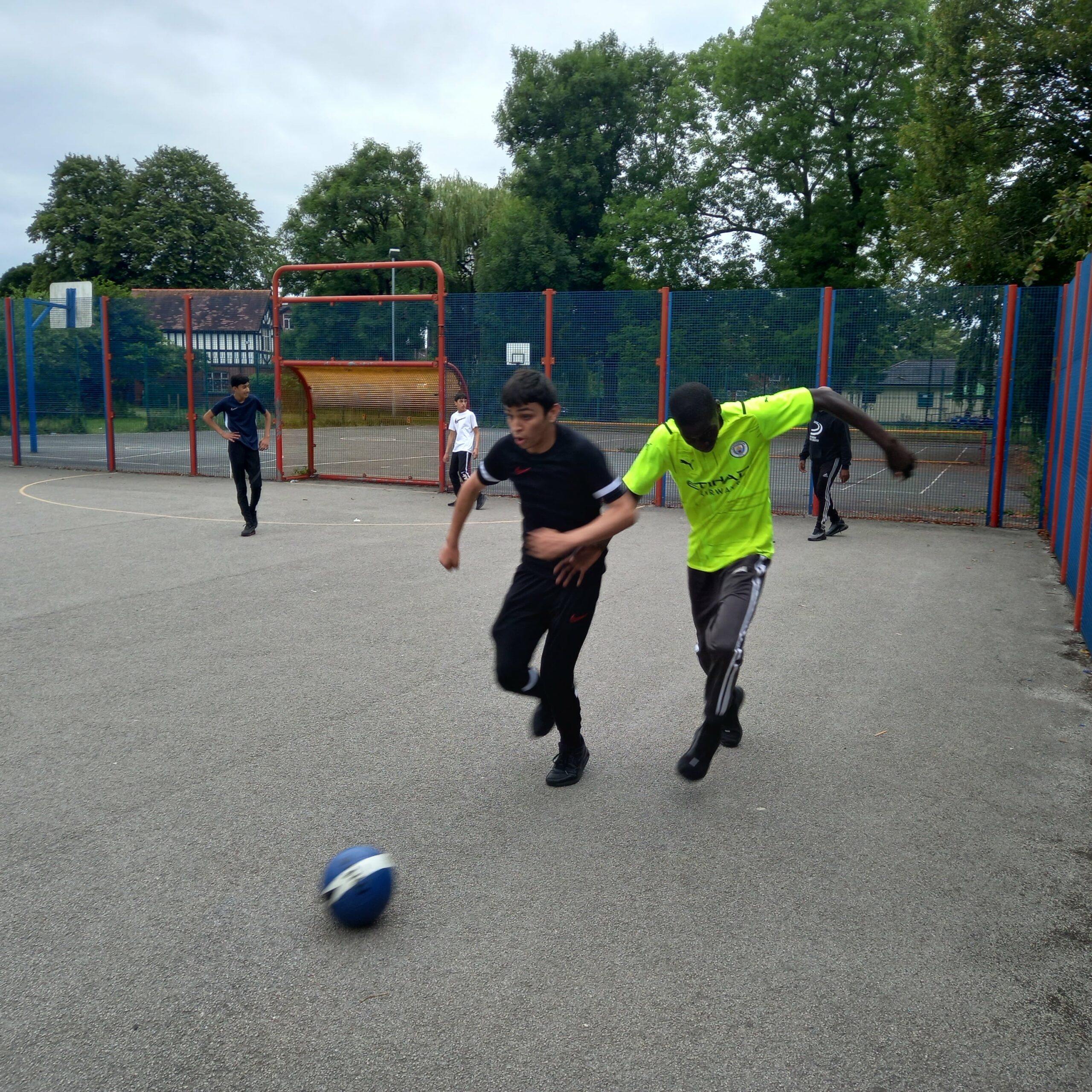 Mo and other young people taking part in sports
