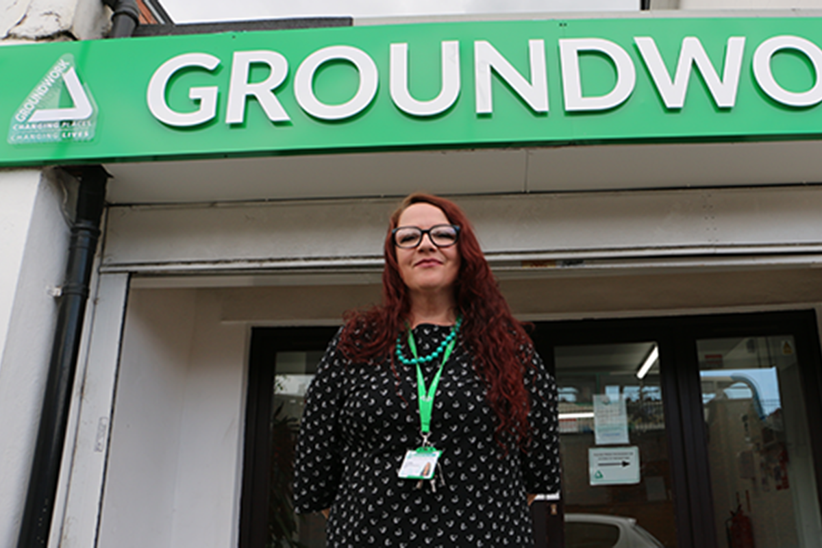 Lee outside the Groundwork office where she now works