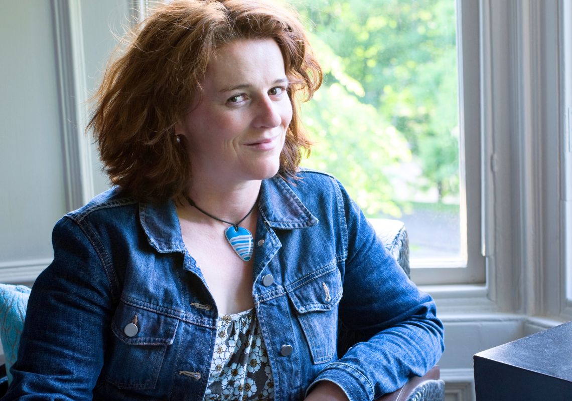 Woman smiling by window