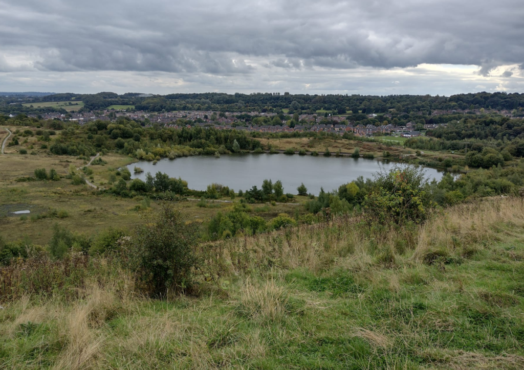 An image showing the view of Silverdale from a hill, including a view of the water