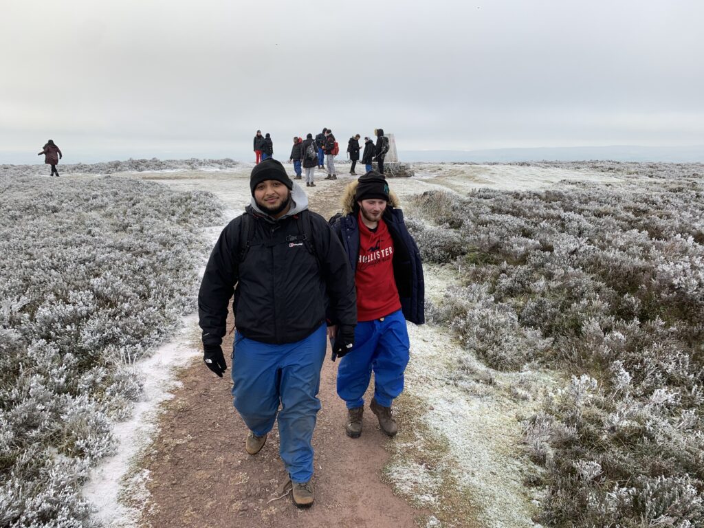 young people on a hike in the mountains