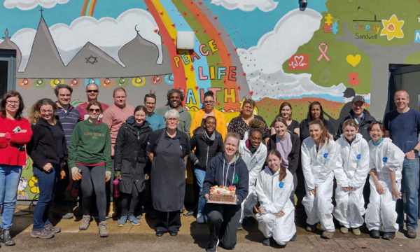 A group of volunteers celebrating their success