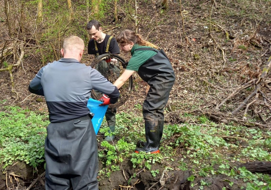 Josh cleaning up rivers for the Medlock Valley project