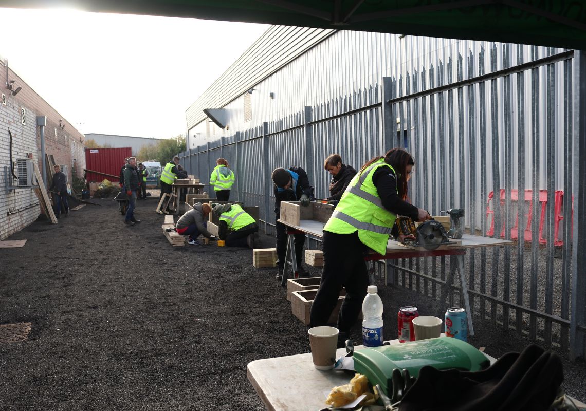 Volunteers creating the community garden