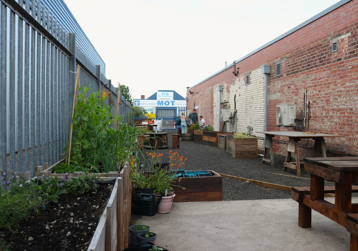 People spending time in the community garden