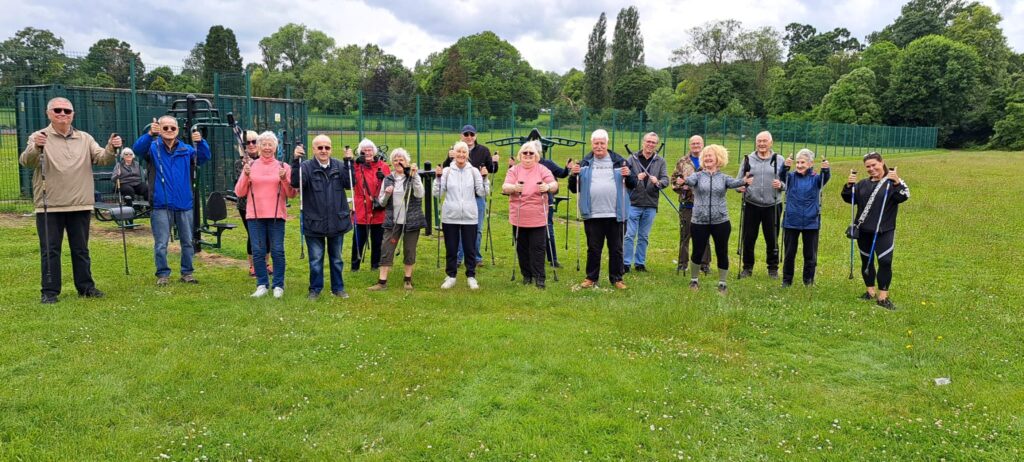 2025 grantees Lex Leisure Walking Group celebrating a group walk with their walking poles