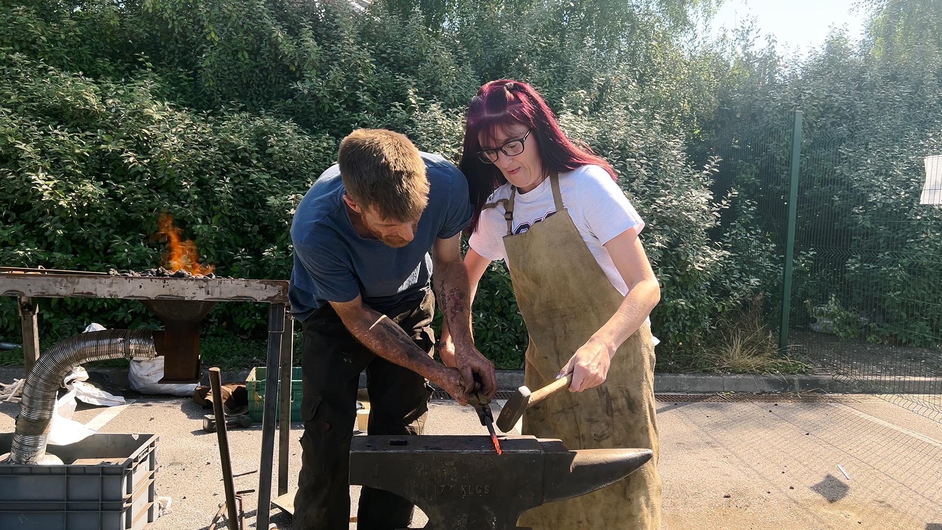 Lady trying ironmongery.