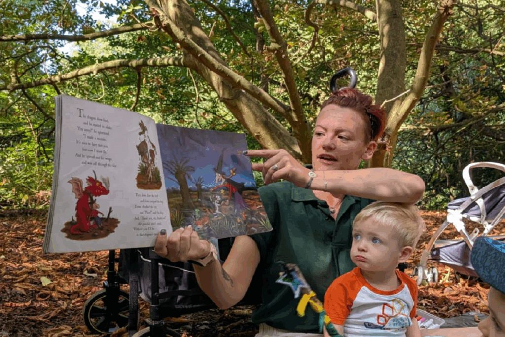 reading a story to children outside