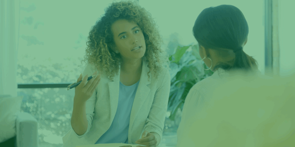 An image showing two people chatting to replicate the scenario of a citizen receiving advice.