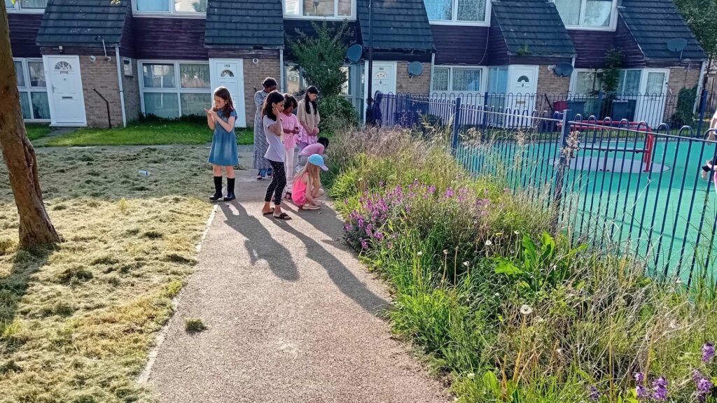Children playing outside in housing estate