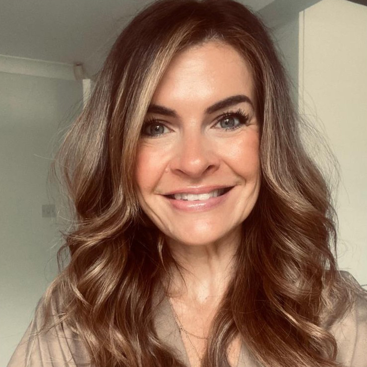 Brunette woman smiling at camera