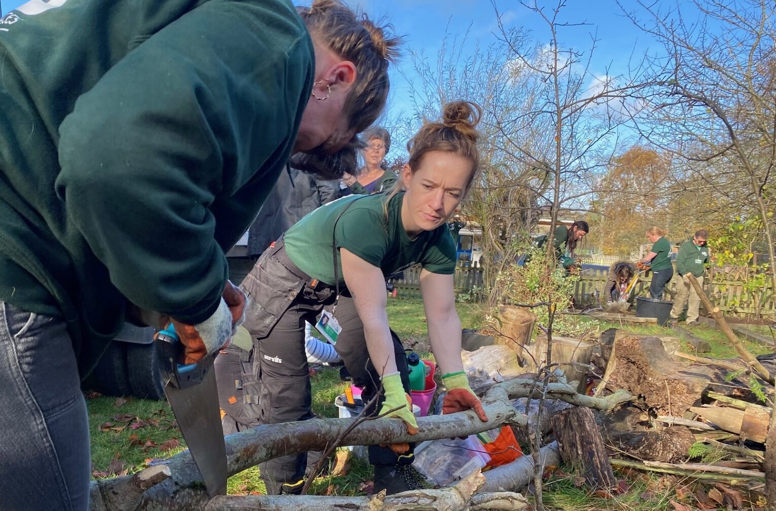 Groundwork staff clearning a garden area