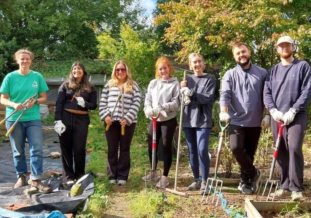 Postcode Gardener with students at the allotment