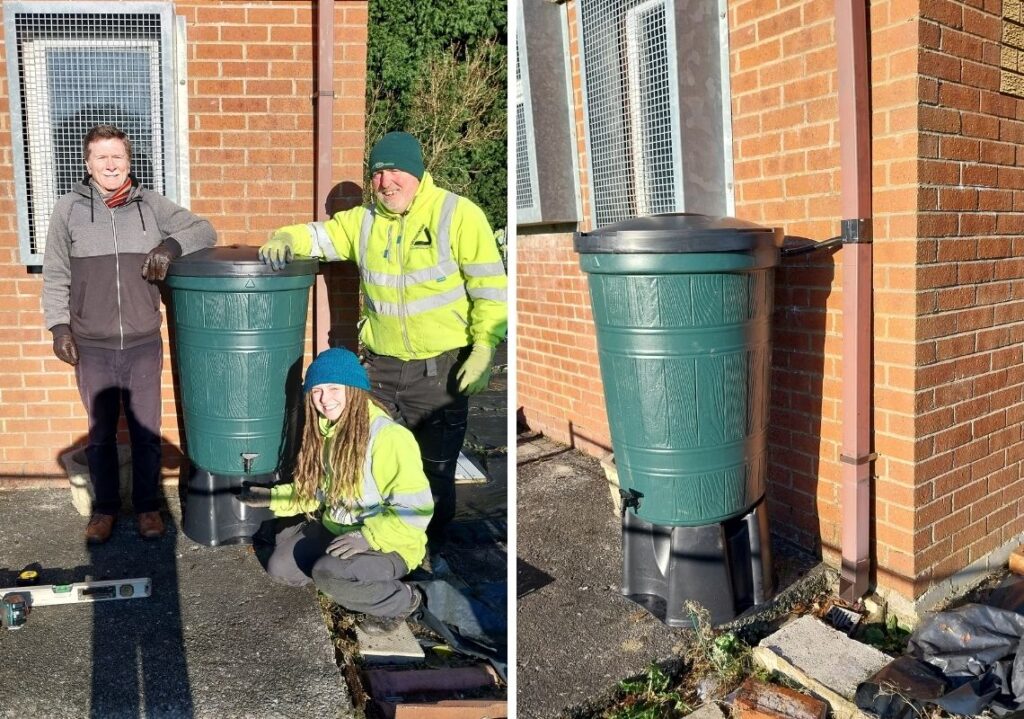 Our team posing with Chris after installing the water butt