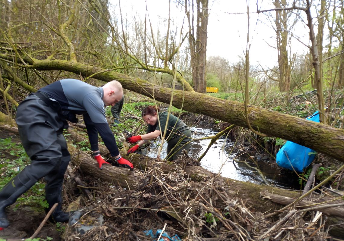 Travis clearing streams for the Medlock Valley Project