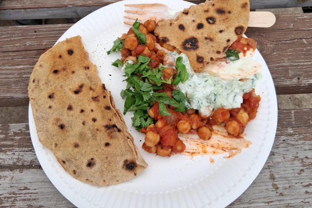 Plate of homemade pitta and chickpea salad