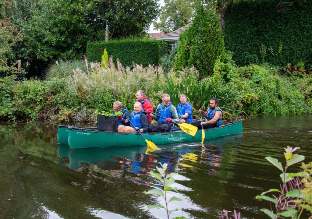 Volunteers helping to clear riverside scrub
