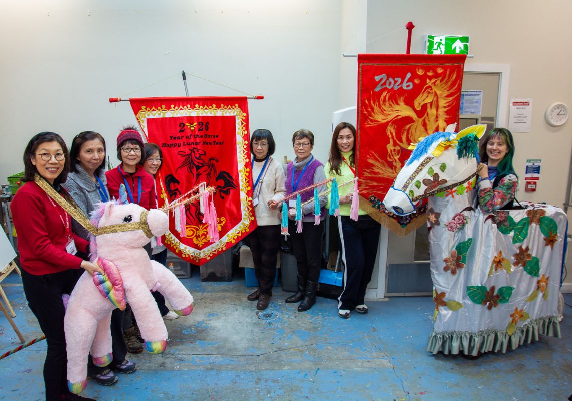 Manchester Rag Revival group posing with their finished creations