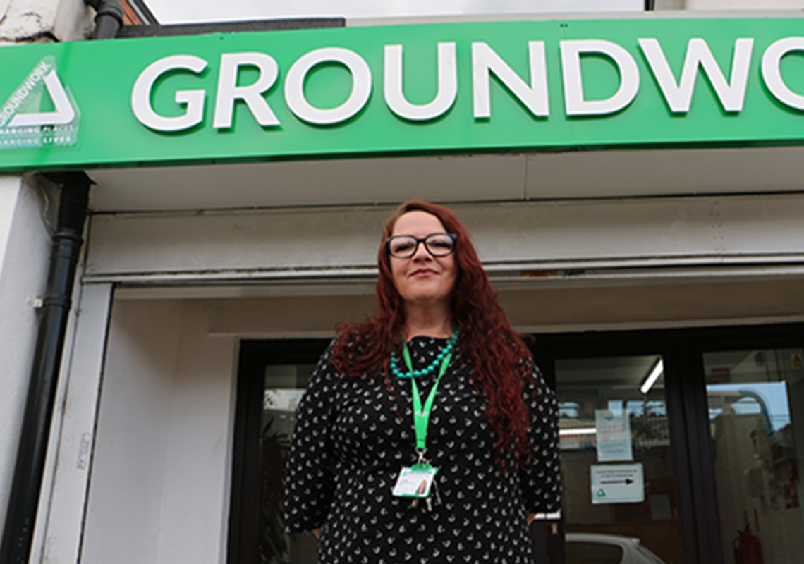A lady stood outside of one of Groundwork's offices