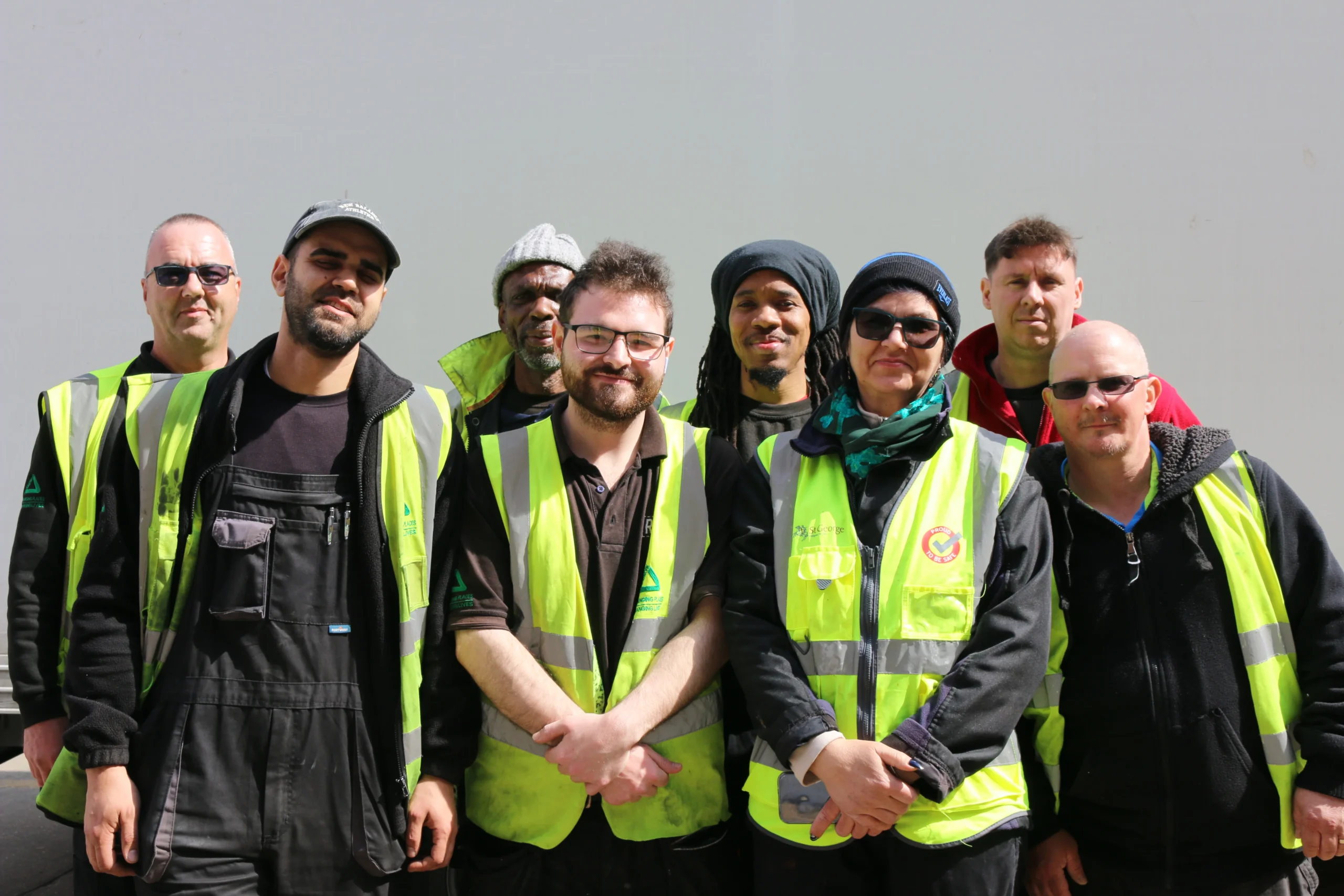 REWORK team in high vis jackets on a sunny day