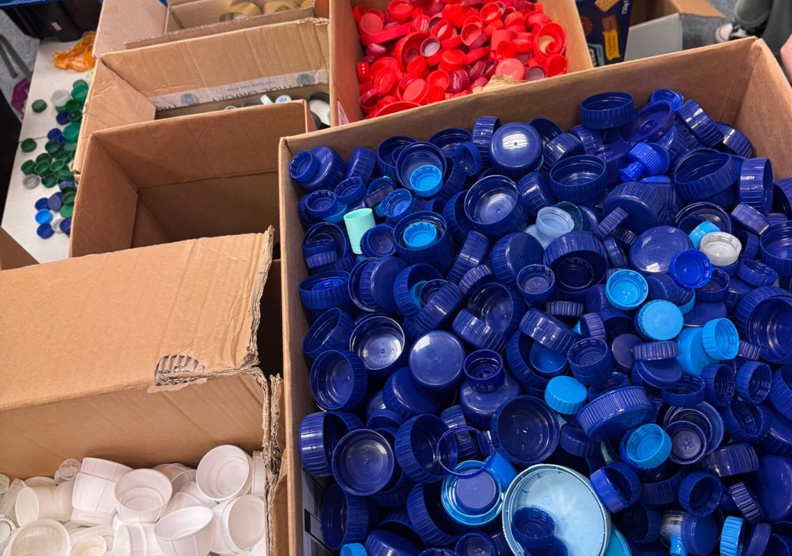 Bottle cap sorting at Plastic Shed