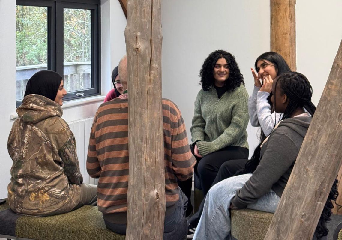Women Warriors having a discussion