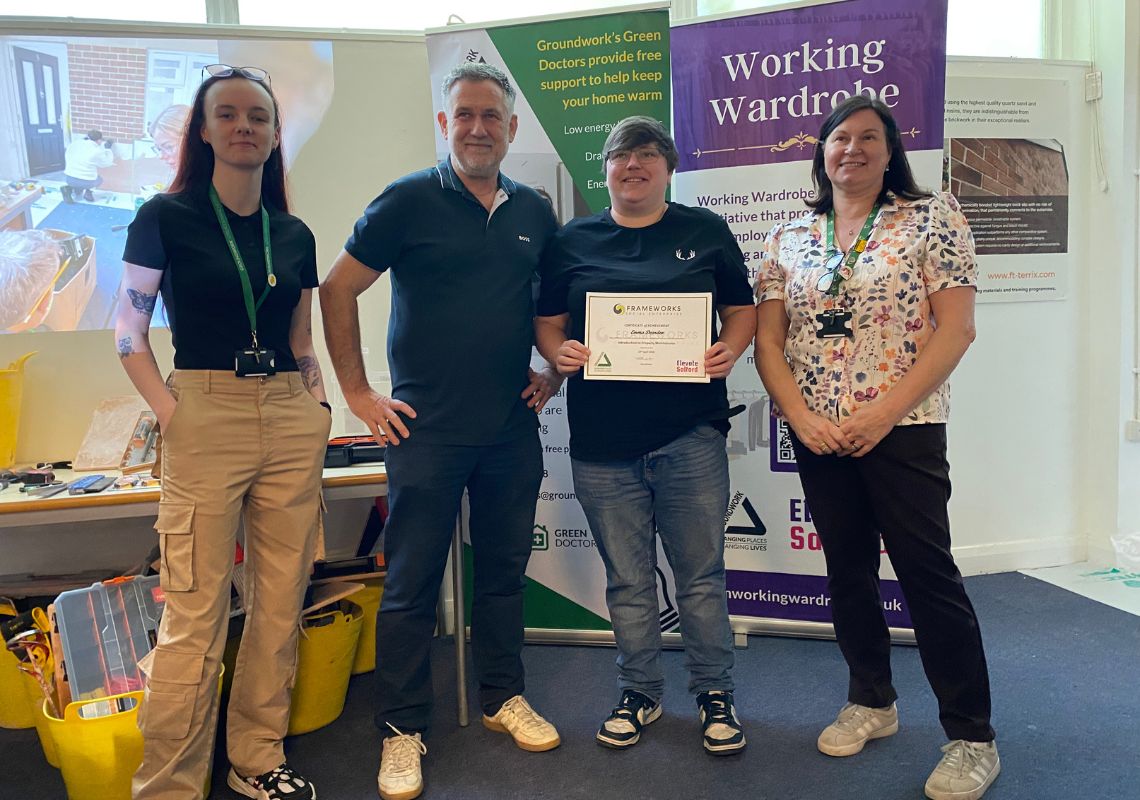Participants posing with women in construction course leaders