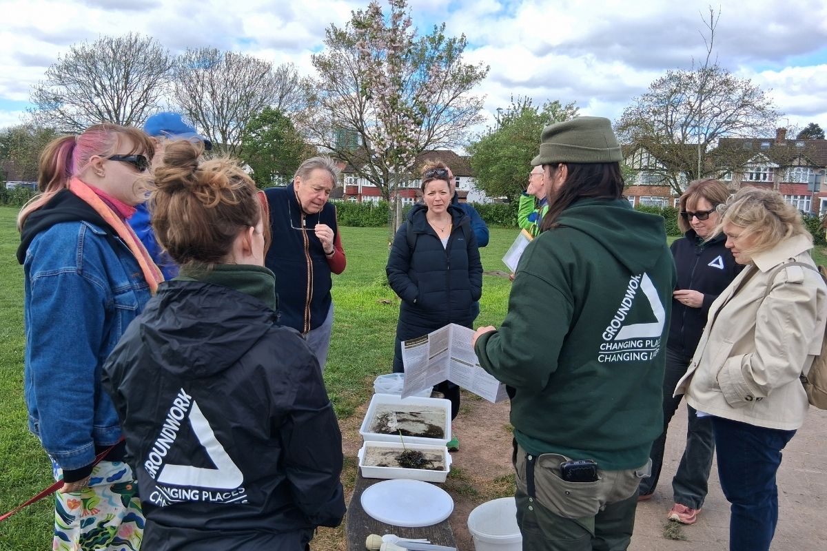 Groundwork East staff leading a riverfly session