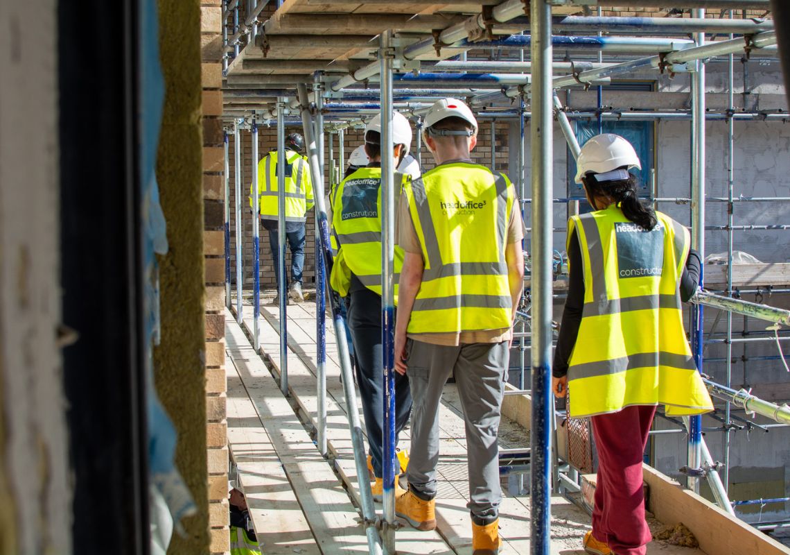 Adela and other participants at their work placement