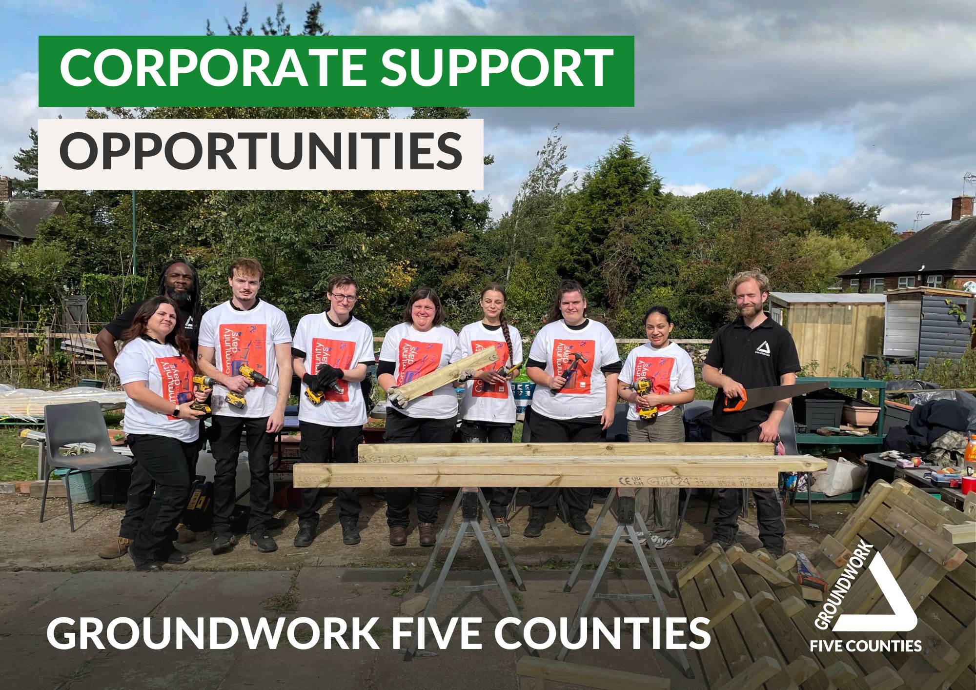 Photo of group of people holding tools and wood, in allotment space. Green and white text and logo
