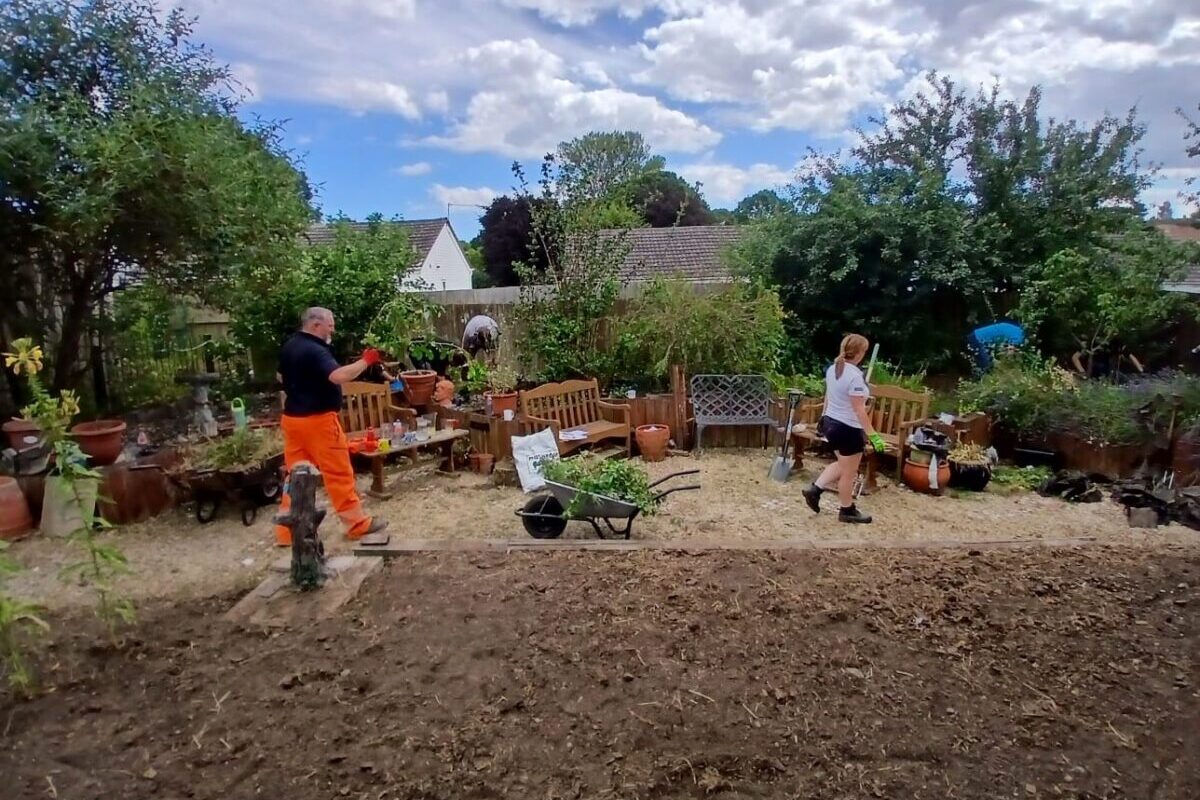 Volunteers workingin a garden
