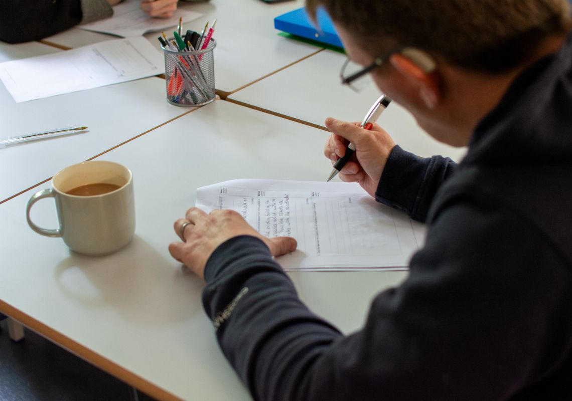 Learner filling in retrofit worksheet