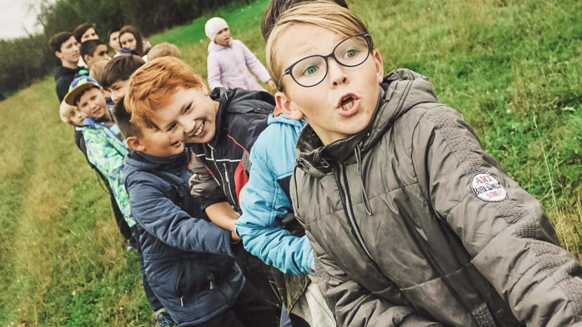 Children play tug-of-war