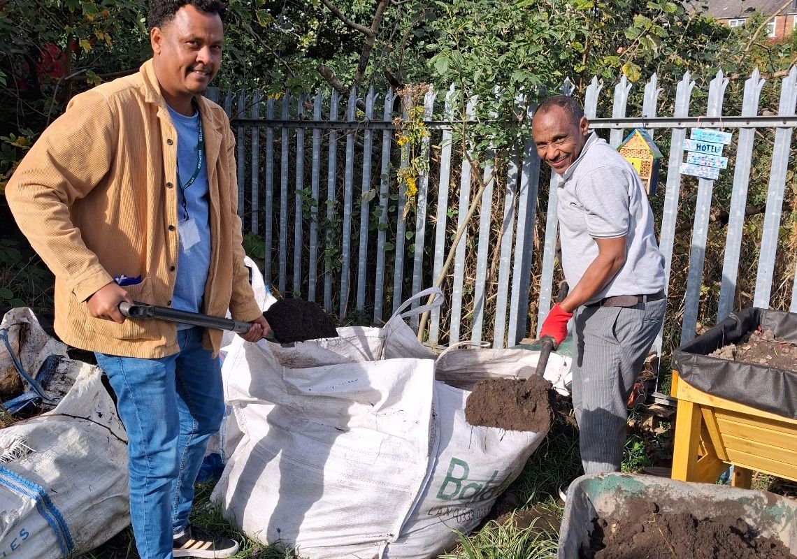Participants gardening at Rainbow Haven