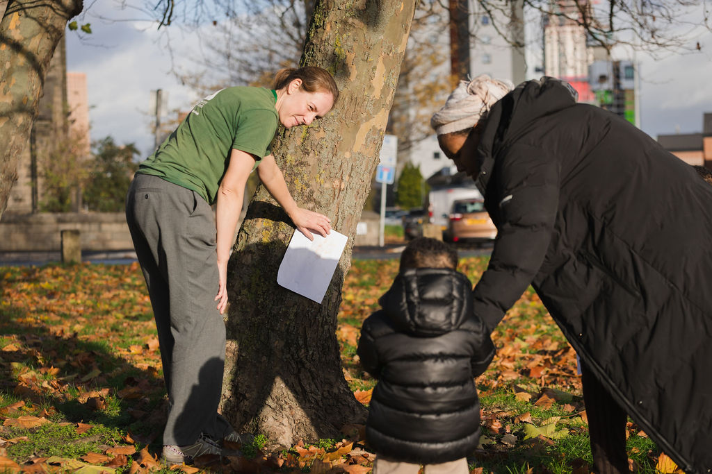 Reaching Communities: Wellies in the Woods photo of a Trainee with a child and mum
